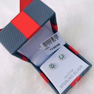 1/6 Carat T.W. Diamond & Blue Topaz Halo Stud Earrings.